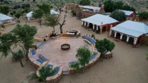 Gallery - Damodra Desert Camp 4 aerial view of amphitheatre restaurant lobby damodra desert camp