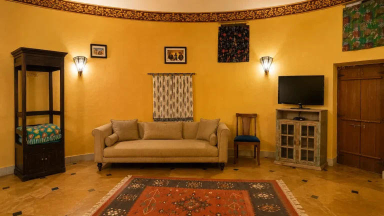 sitting area in luxury cottage suite at damodra desert camp