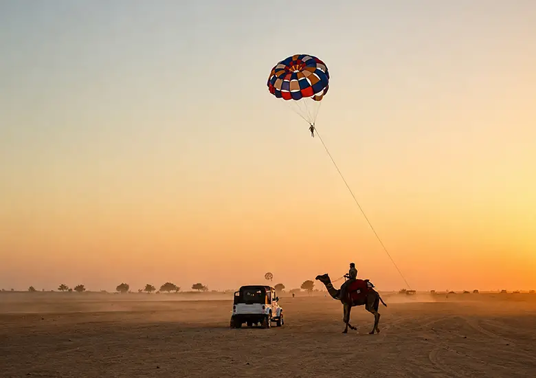 sunset parasailing experience with damodra desert camp